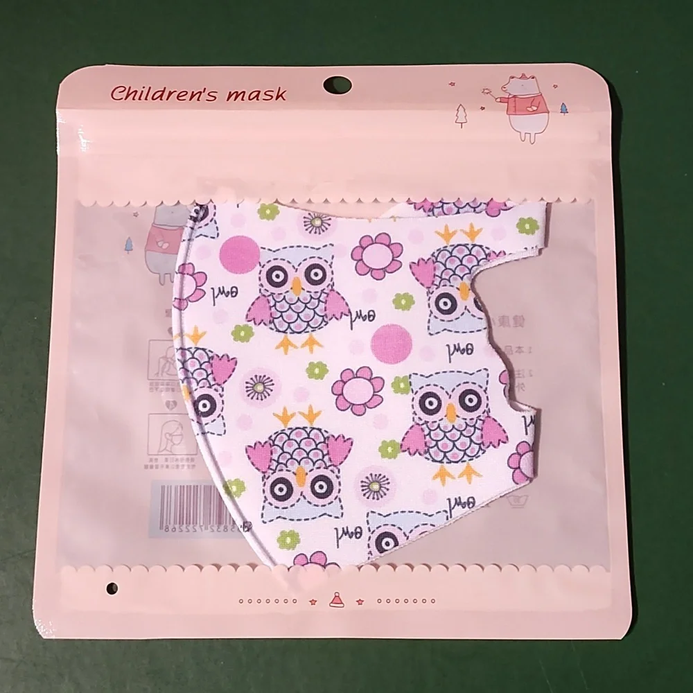 Children's re Usable face mask new in package never opened